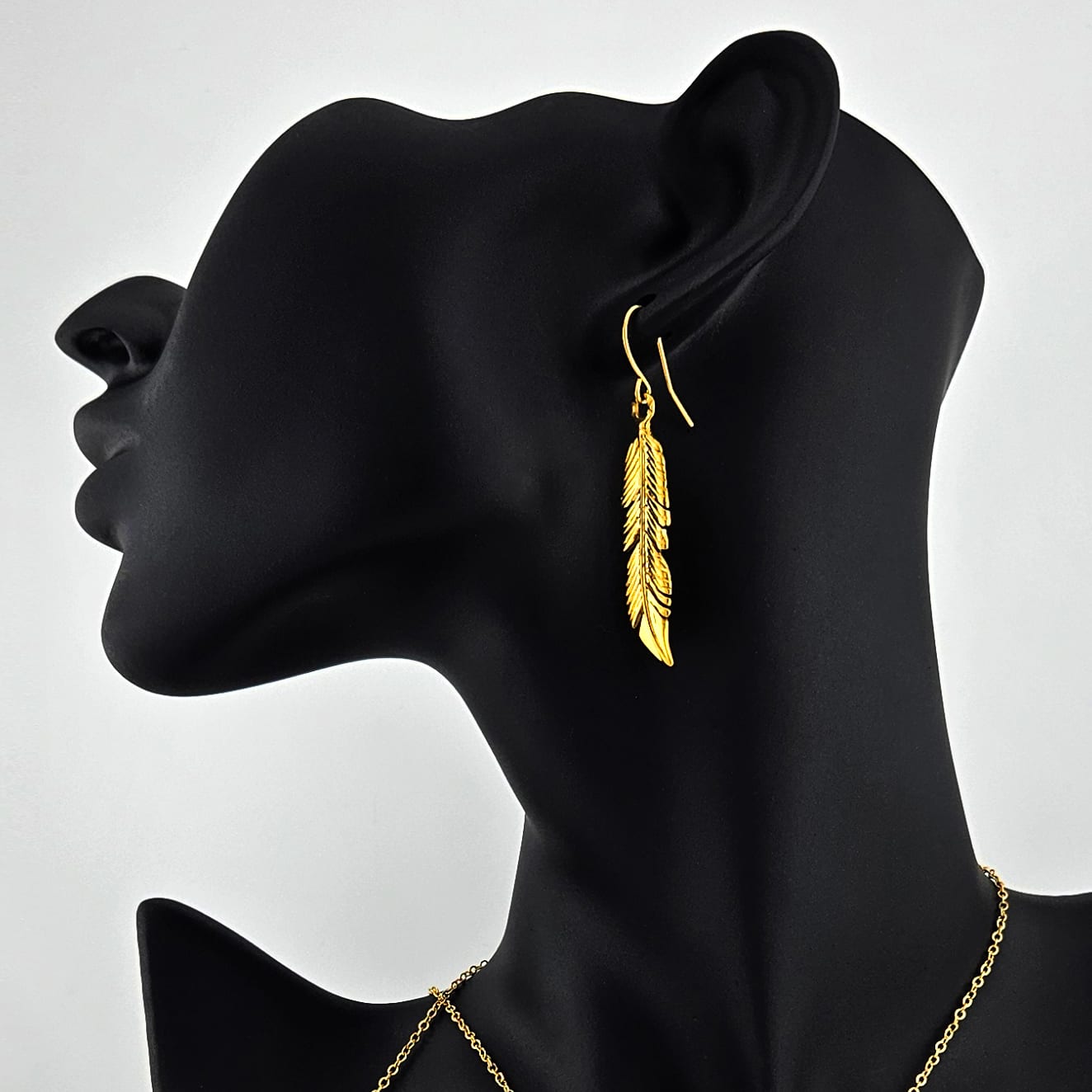 Royal Feather earrings — hand-finished gold-plated earrings